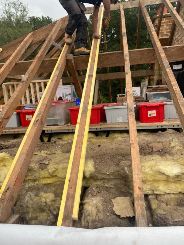 Roof rafters repaired and insulated from inside the loft