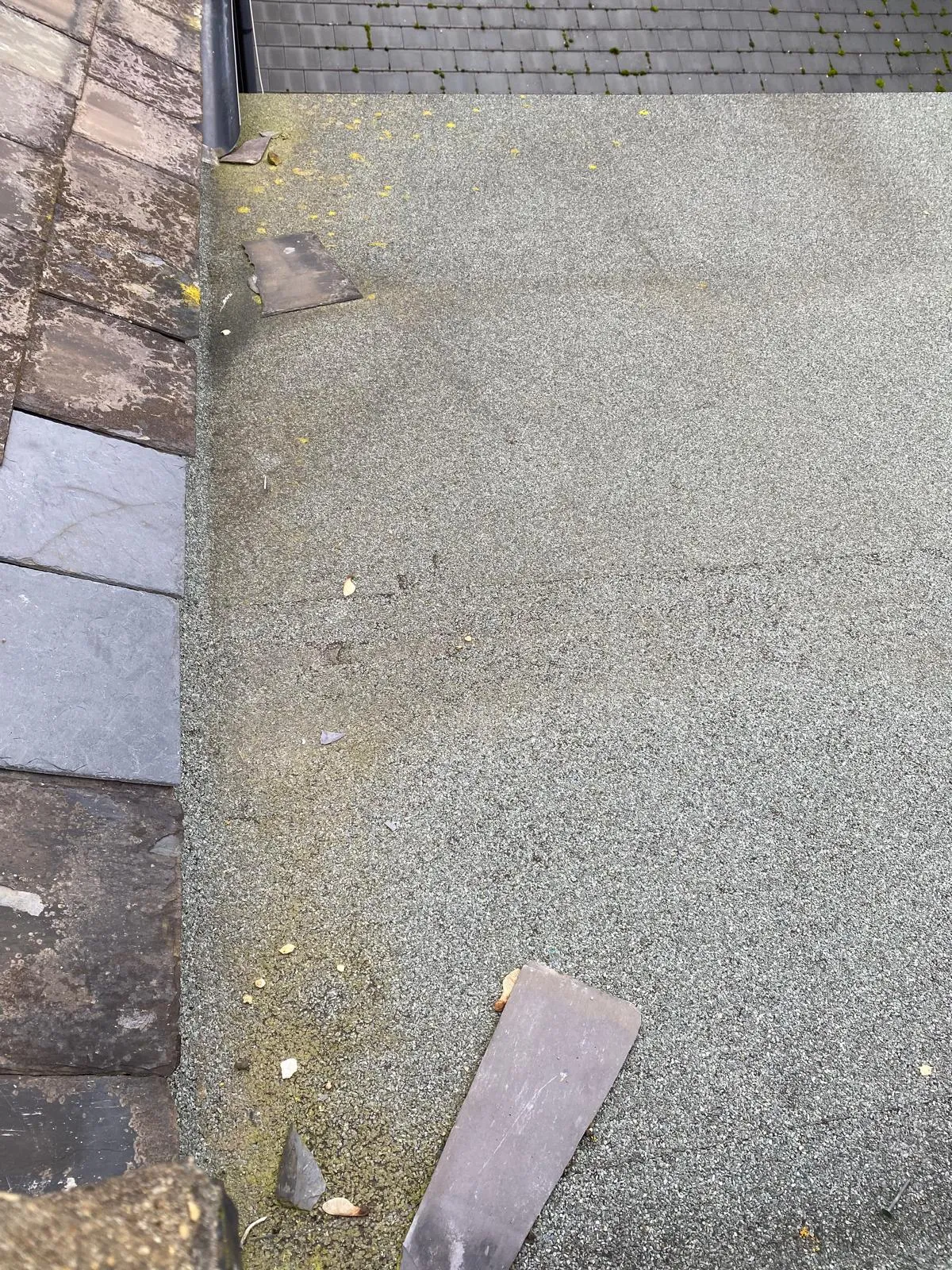 Lead valley gutter between slate roof slopes on a Victorian property
