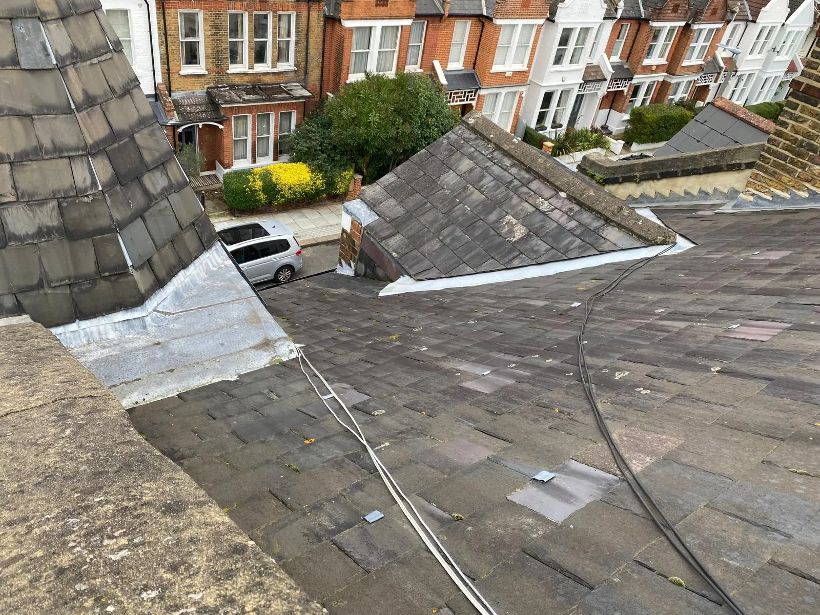Conical slate turret spire on a Victorian house, inspected and repaired