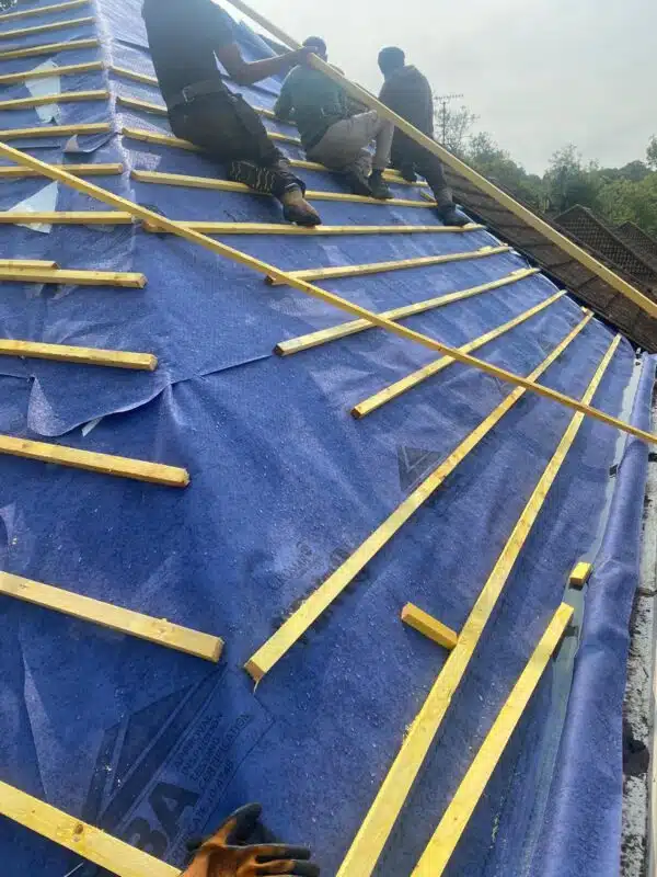Hipped roof stripped back to new breathable membrane and timber battens
